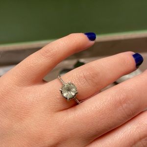 Sterling silver light green topaz halo ring